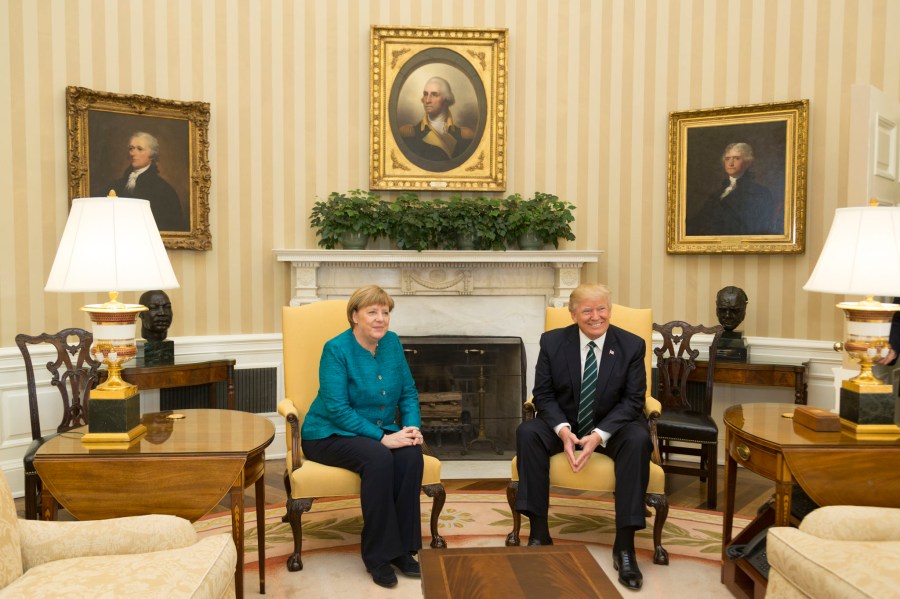 President Donald Trump greets and meets with German Chancellor Angela Merkel